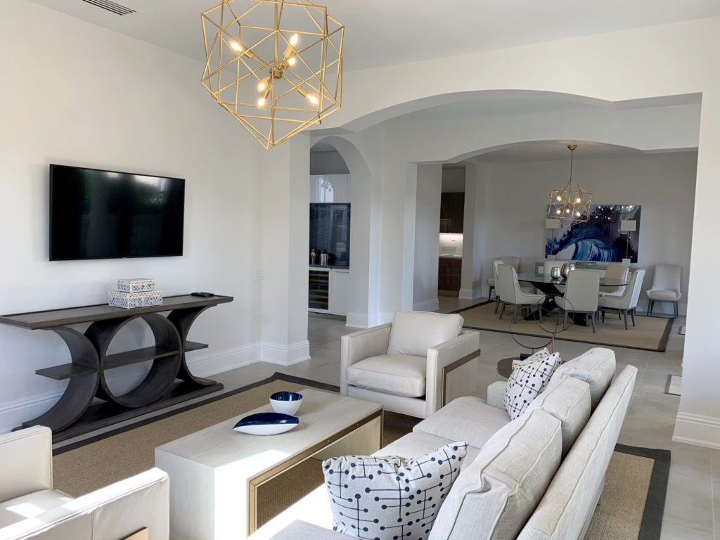 Renovated Florida room with dining room & hall in background
