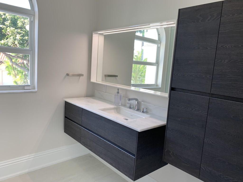 Floating vanity in remodeled guest bedroom-1 bathroom