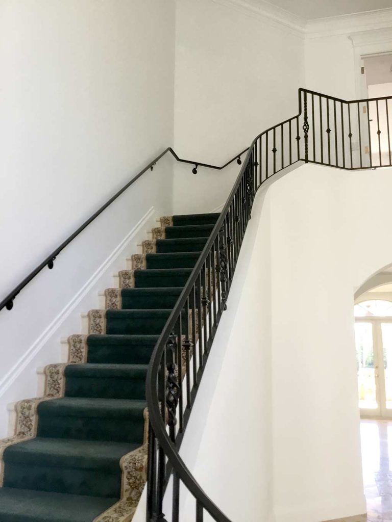 Foyer staircase before home renovation