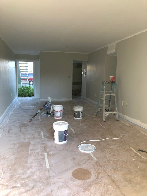 During photo of foyer and living room.