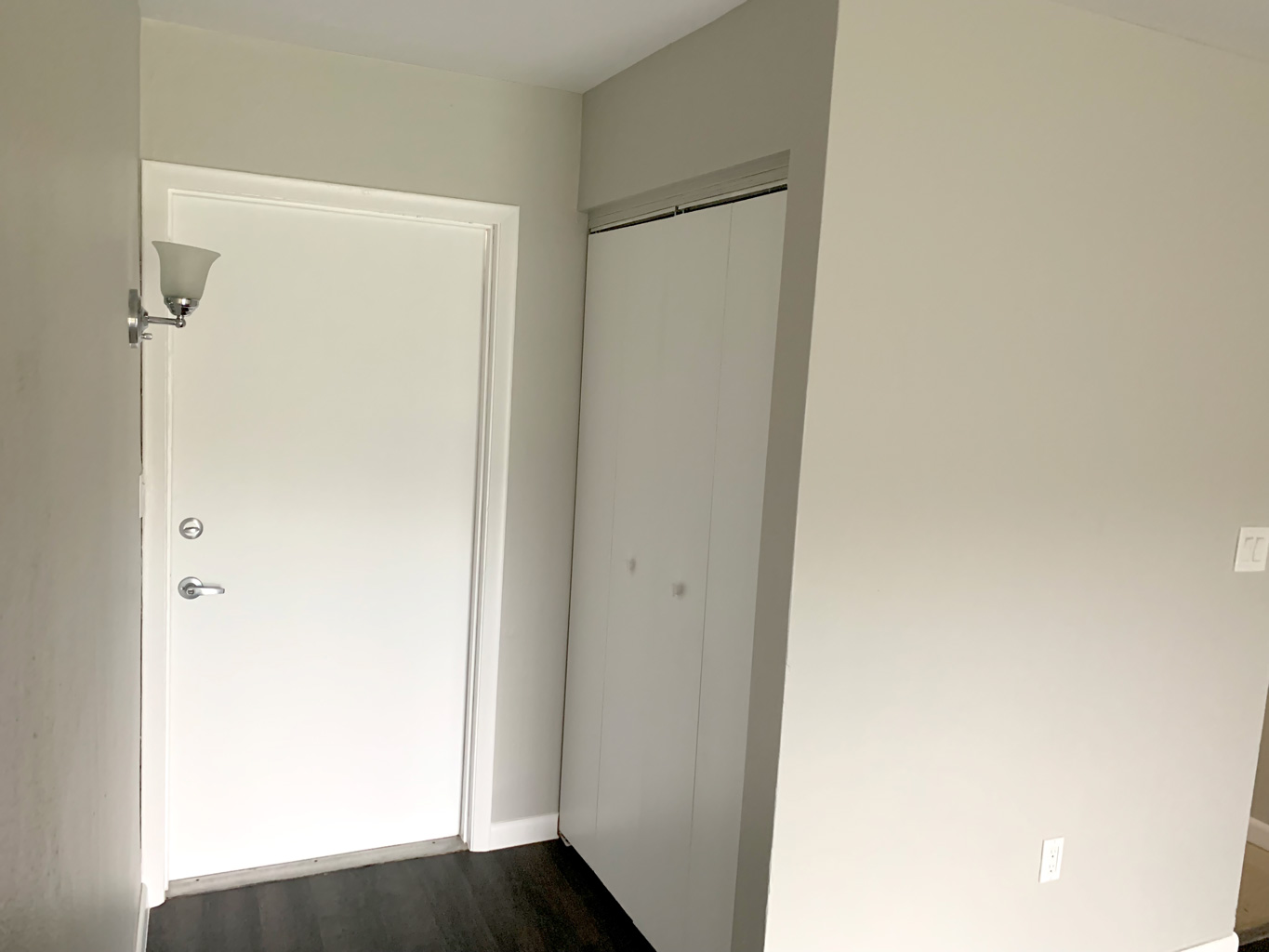 After photo of foyer and foyer closet.