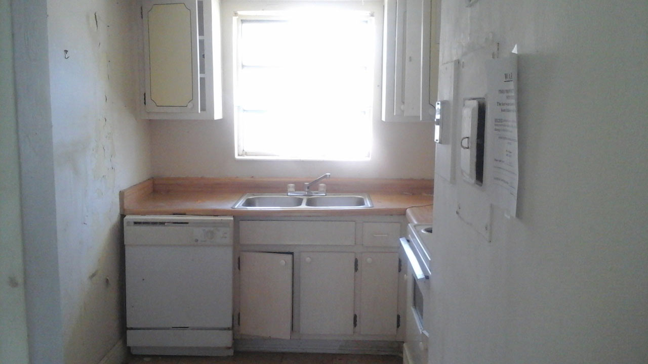 Before photo of kitchen cabinets
