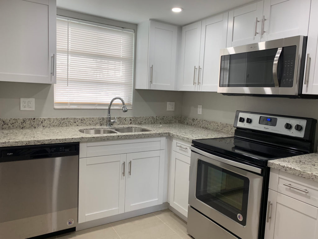 After photo of kitchen of this R.E.O. rehab project