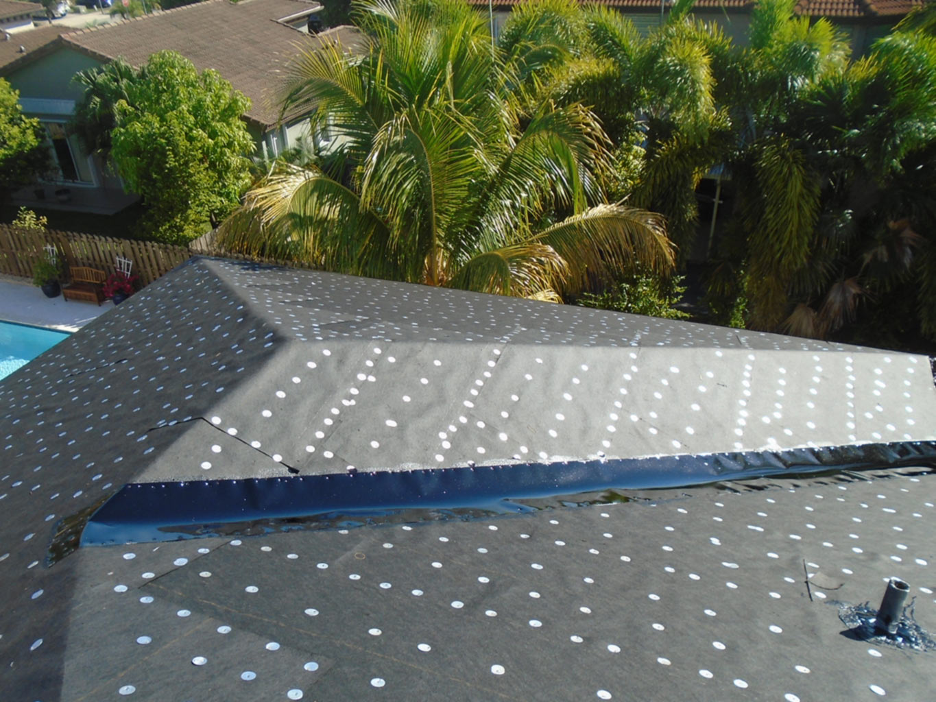 Roof after tin-cap installation.