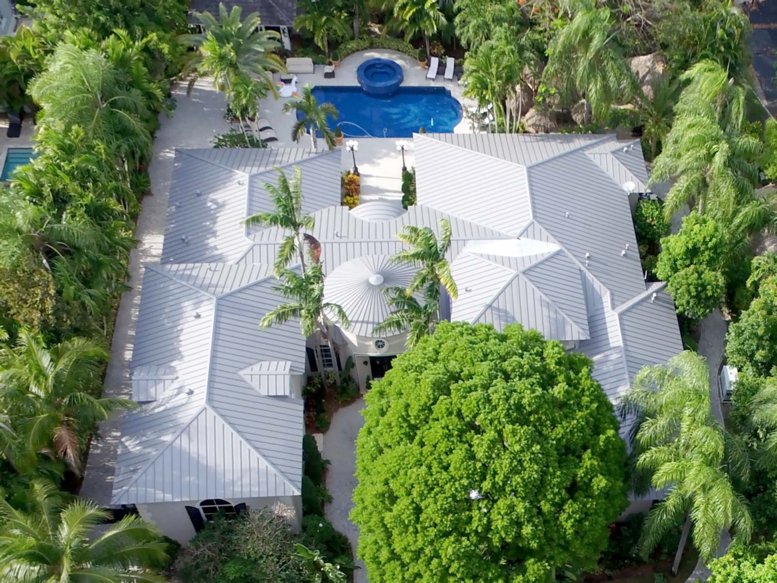 Aerial view of new large galvalume roof in Pinecrest