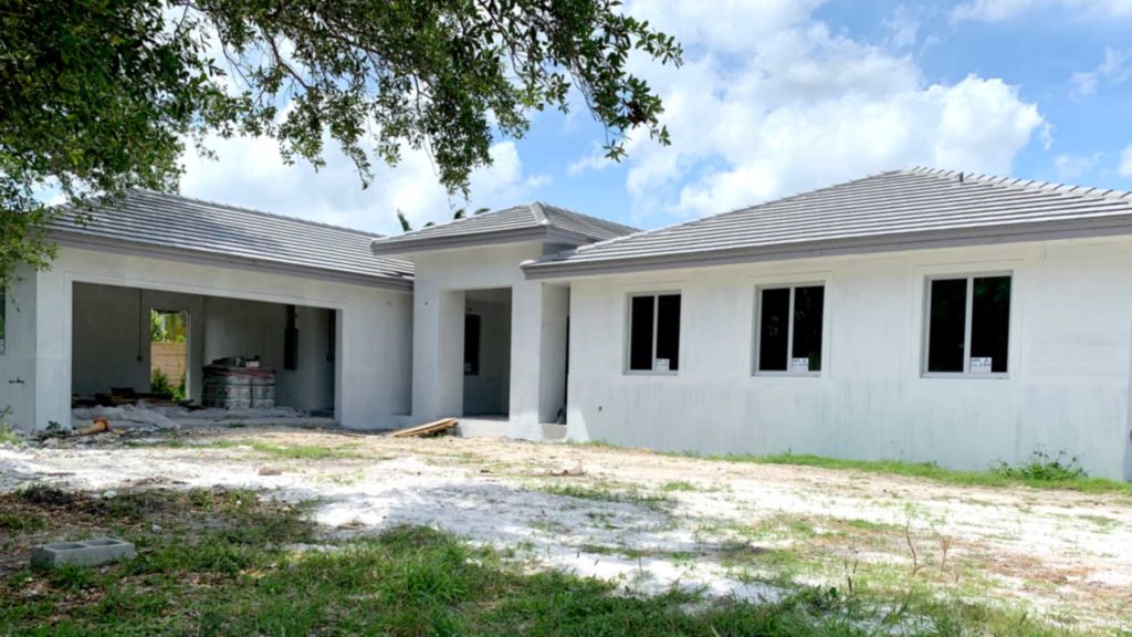 Exterior walls are primed and ready for paint